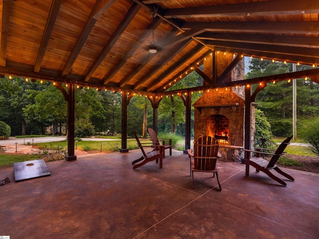 170 Shirleys Farm Rd, Seneca, SC 29678 - view of patio featuring an outdoor stone fireplace, a gazebo, and view of scattered trees