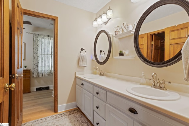 105 Fox Chase Ct, Simpsonville, SC 29680 - full bath featuring double vanity and wood finished floors