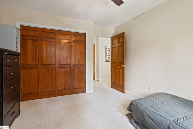 105 Fox Chase Ct, Simpsonville, SC 29680 - bedroom with light colored carpet, ceiling fan, and a closet