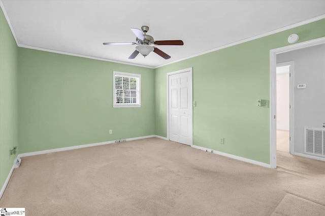 402 Rosebud Ct, Greer, SC 29650 - unfurnished bedroom featuring ornamental molding, carpet floors, a closet, and a ceiling fan