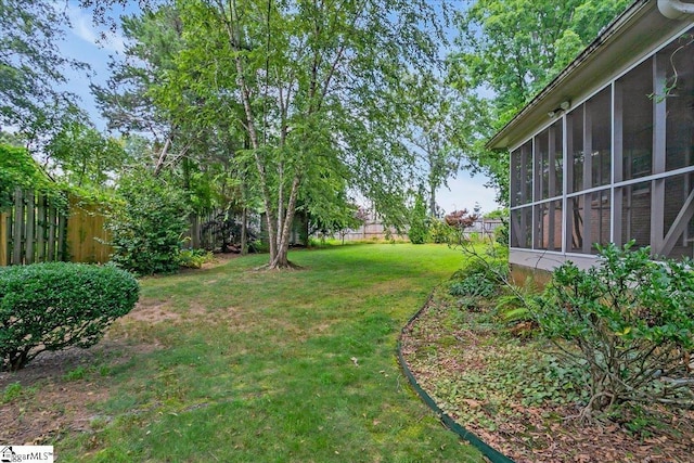 402 Rosebud Ct, Greer, SC 29650 - fenced backyard featuring a sunroom