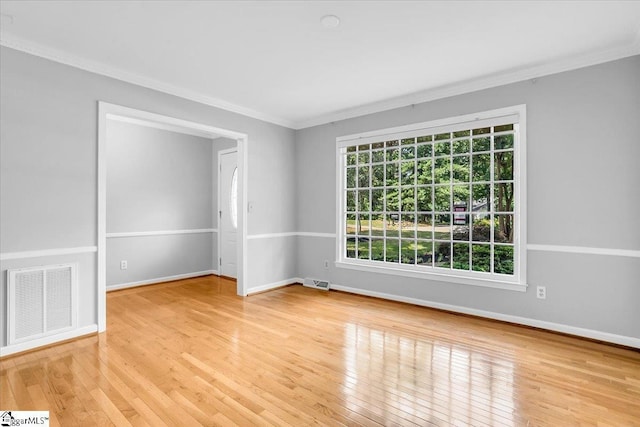 402 Rosebud Ct, Greer, SC 29650 - empty room with ornamental molding and wood finished floors