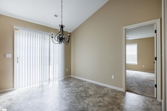 18 Herndon Ct, Simpsonville, SC 29681 - spare room with a chandelier, vaulted ceiling, and stone finish floors