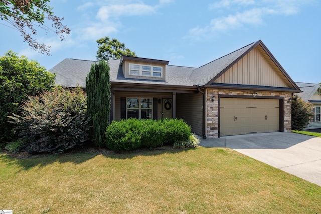 18 Herndon Ct, Simpsonville, SC 29681 - craftsman inspired home featuring a garage, concrete driveway, stone siding, a front yard, and roof with shingles