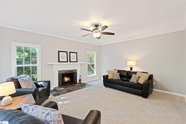 629 Germander Ct, Greer, SC 29651 - carpeted living area with crown molding, a ceiling fan, healthy amount of natural light, and a fireplace