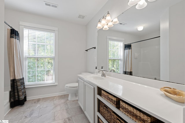 629 Germander Ct, Greer, SC 29651 - full bathroom featuring vanity, healthy amount of natural light, marble look tile flooring, and a shower with shower curtain