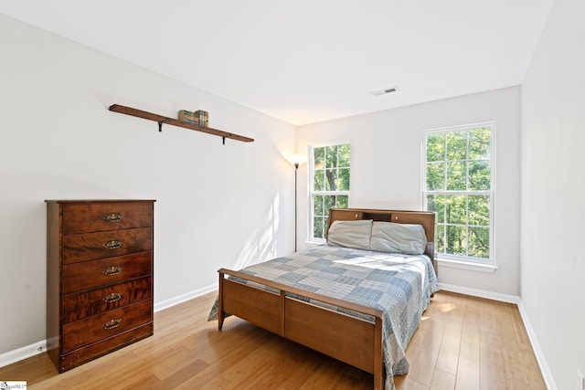 629 Germander Ct, Greer, SC 29651 - bedroom featuring light wood-type flooring and baseboards