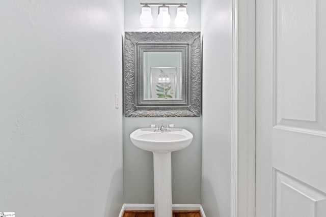 629 Germander Ct, Greer, SC 29651 - bathroom with baseboards and wood finished floors