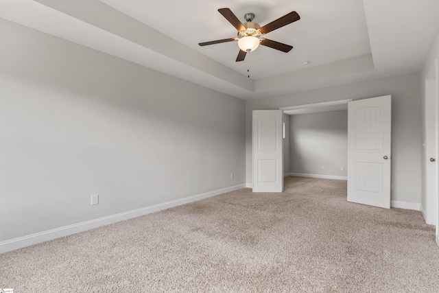 138 Rushing Creek Ln, Piedmont, SC 29673 - unfurnished bedroom with light colored carpet, a raised ceiling, and a ceiling fan
