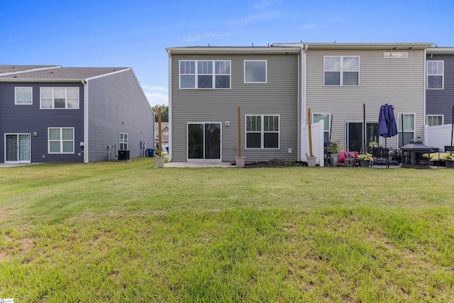 138 Rushing Creek Ln, Piedmont, SC 29673 - back of property featuring a patio area and a lawn