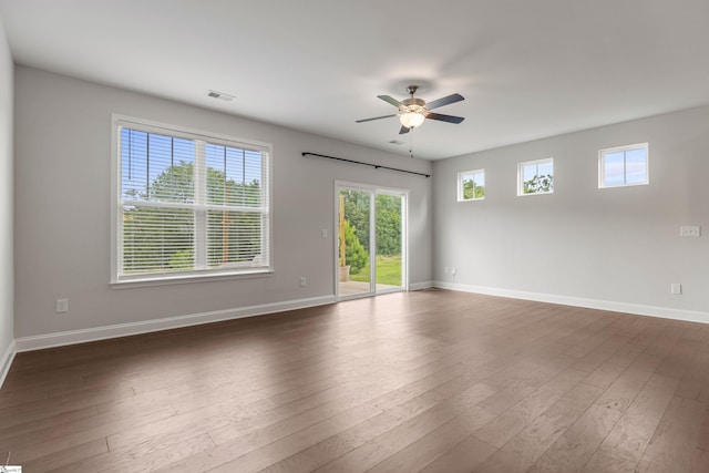 138 Rushing Creek Ln, Piedmont, SC 29673 - unfurnished room with a ceiling fan, plenty of natural light, and dark wood-style floors