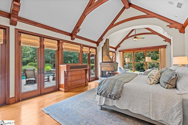 4 Huntington Ct, Greenville, SC 29615 - bedroom with access to exterior, wood finished floors, french doors, and arched walkways