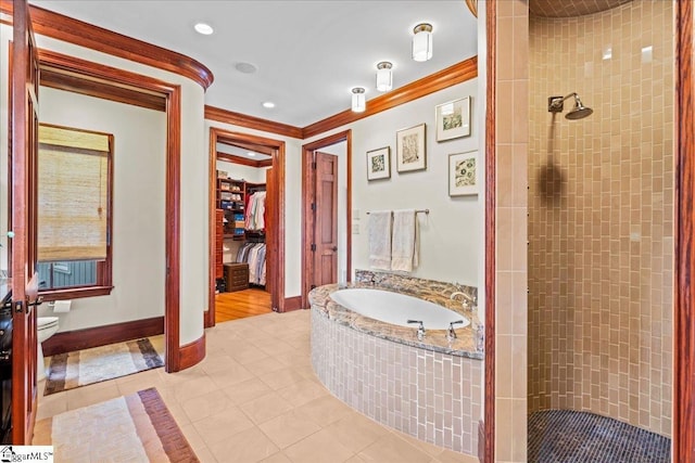 4 Huntington Ct, Greenville, SC 29615 - bathroom featuring crown molding, a stall shower, a bath, tile patterned floors, and a walk in closet