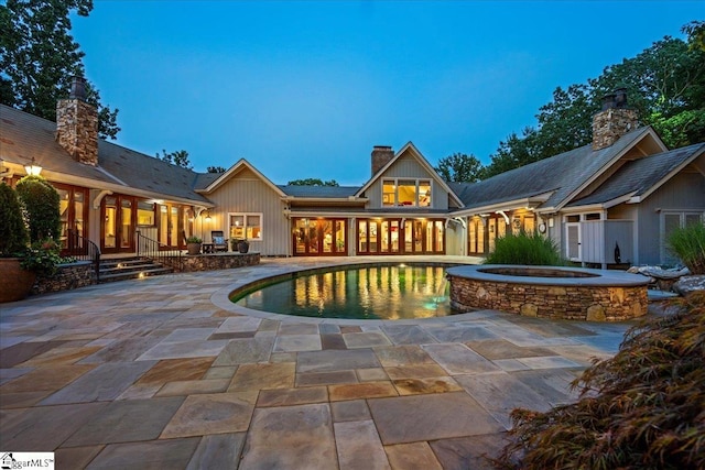 4 Huntington Ct, Greenville, SC 29615 - swimming pool with a patio and an in-ground hot tub
