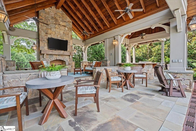 4 Huntington Ct, Greenville, SC 29615 - view of patio featuring an outdoor stone fireplace, ceiling fan, and a gazebo