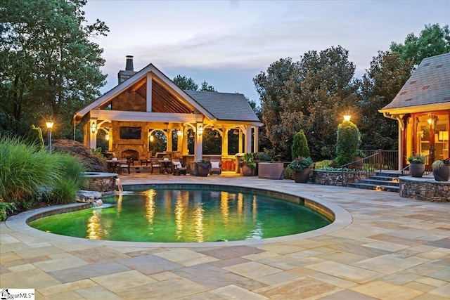 4 Huntington Ct, Greenville, SC 29615 - swimming pool with an outdoor stone fireplace, a gazebo, and a patio area