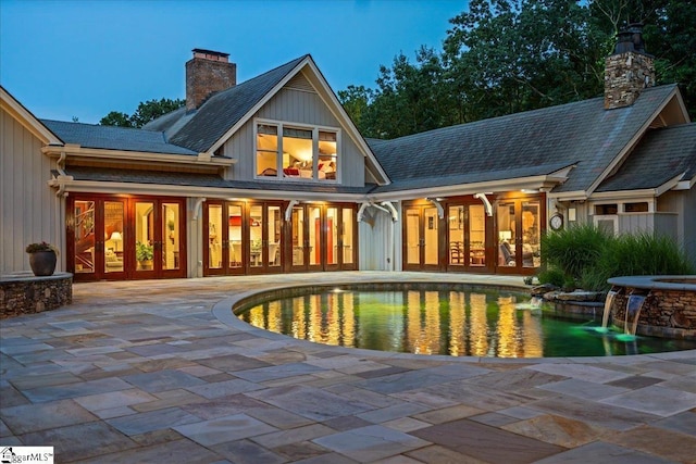 4 Huntington Ct, Greenville, SC 29615 - back of house featuring a chimney, french doors, and a patio area