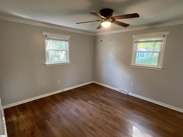 204 Sherondale Ln, Simpsonville, SC 29680 - spare room featuring ceiling fan, dark wood-style flooring, and crown molding