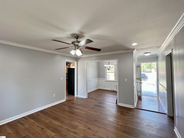 204 Sherondale Ln, Simpsonville, SC 29680 - unfurnished room with ceiling fan, crown molding, a chandelier, and dark wood finished floors