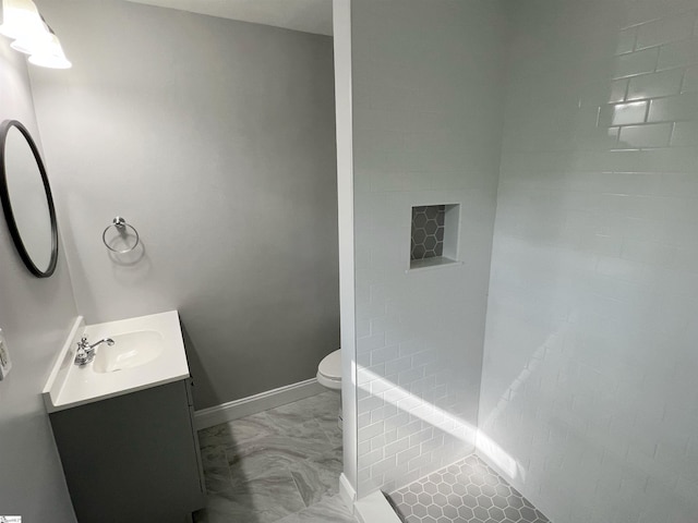 204 Sherondale Ln, Simpsonville, SC 29680 - bathroom featuring vanity, marble finish flooring, and tiled shower