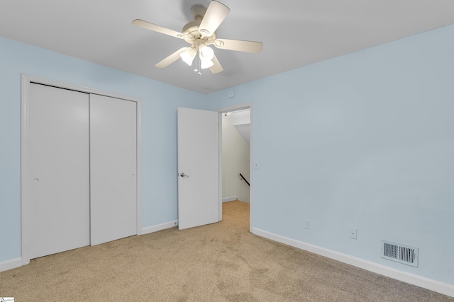 501 Edwards Rd Unit 2, Greenville, SC 29615 - unfurnished bedroom featuring carpet floors, a closet, and a ceiling fan