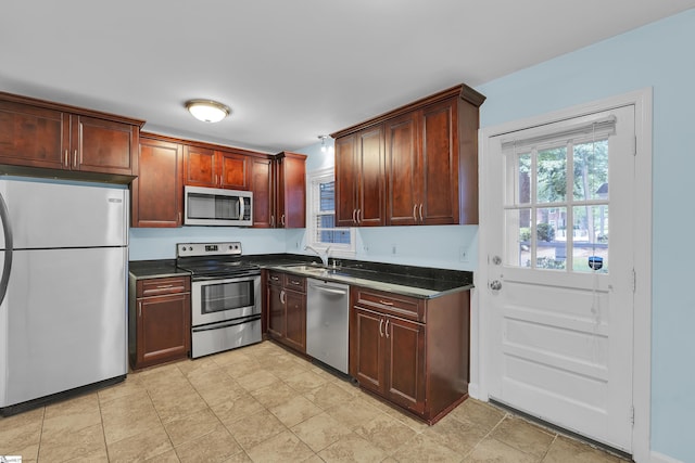 501 Edwards Rd Unit 2, Greenville, SC 29615 - kitchen featuring appliances with stainless steel finishes and dark stone counters