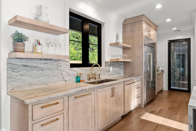 304 Waterford Fall Way, Simpsonville, SC 29681 - kitchen featuring open shelves, built in refrigerator, light brown cabinetry, tasteful backsplash, and light wood-style flooring