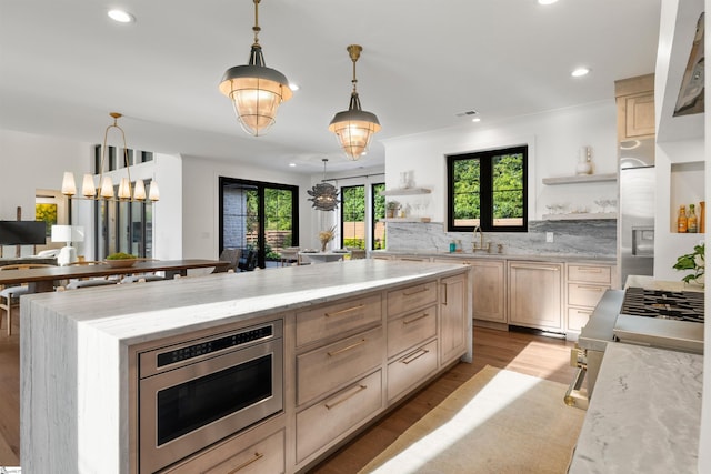 304 Waterford Fall Way, Simpsonville, SC 29681 - kitchen with open shelves, stainless steel microwave, light wood finished floors, recessed lighting, and light brown cabinets