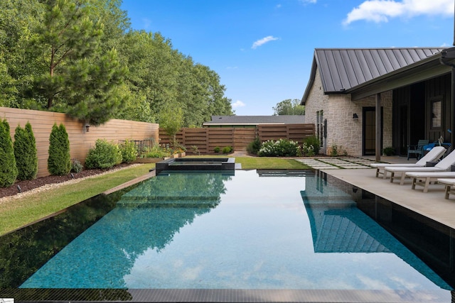 304 Waterford Fall Way, Simpsonville, SC 29681 - view of swimming pool with a fenced backyard, a patio area, and a pool with connected hot tub