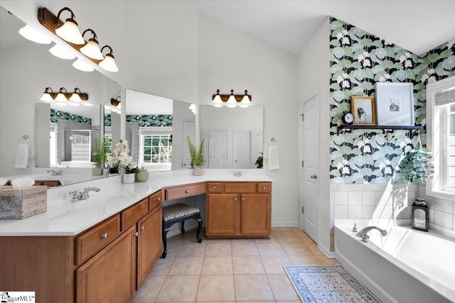 9 Springhead Way, Greer, SC 29650 - bathroom featuring double vanity, a garden tub, tile patterned flooring, high vaulted ceiling, and a shower with shower door