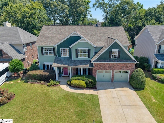 9 Springhead Way, Greer, SC 29650 - view of front facade featuring driveway, brick siding, an attached garage, a shingled roof, and a front yard