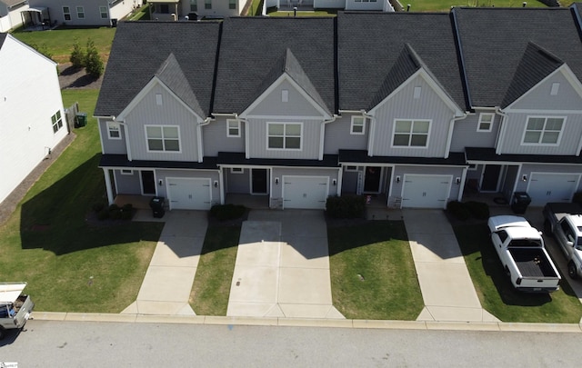 158 Clingstone Trl, Duncan, SC 29334 - multi unit property featuring board and batten siding, a garage, driveway, a shingled roof, and a front yard