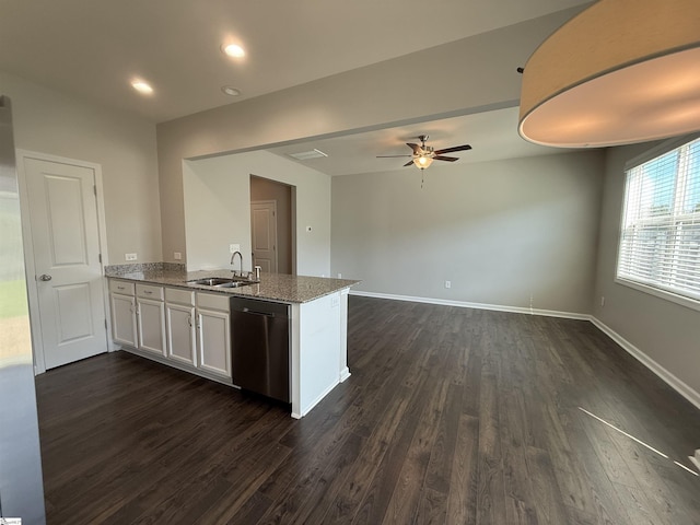158 Clingstone Trl, Duncan, SC 29334 - kitchen with stainless steel dishwasher, dark wood-style floors, a peninsula, ceiling fan, and light stone countertops