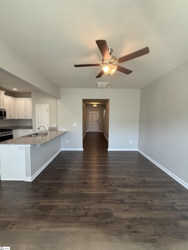 158 Clingstone Trl, Duncan, SC 29334 - unfurnished living room featuring a ceiling fan and dark wood-style flooring