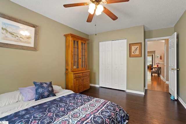 17 Lantern Ln, Greer, SC 29651 - bedroom with dark wood-style floors, a closet, a ceiling fan, and a textured ceiling