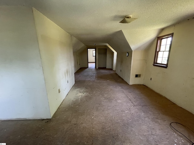875 Love And Care Rd, Six Mile, SC 29682 - additional living space with vaulted ceiling and a textured ceiling
