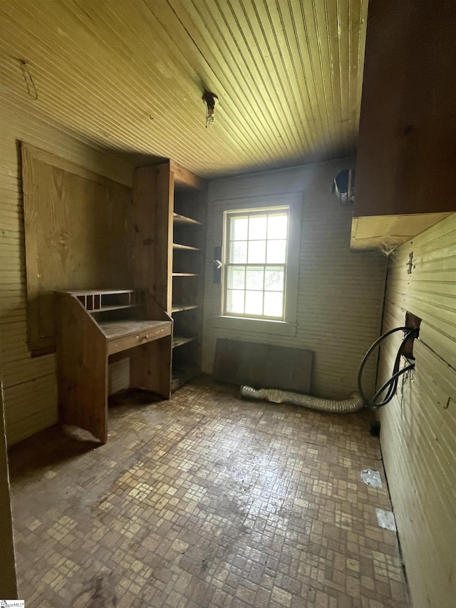 875 Love And Care Rd, Six Mile, SC 29682 - laundry area featuring hookup for a washing machine, brick patterned floors, wood ceiling, cabinet space, and wooden walls