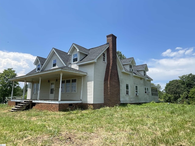 875 Love And Care Rd, Six Mile, SC 29682 - view of side of property featuring a chimney, covered porch, and roof with shingles