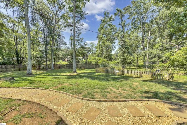 512 Old Mill Rd, Mauldin, SC 29662 - fenced backyard with view of wooded area