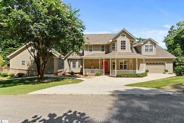 436 S Lakeview Dr, Duncan, SC 29334 - view of front of home with covered porch, driveway, a front lawn, an attached garage, and a shingled roof