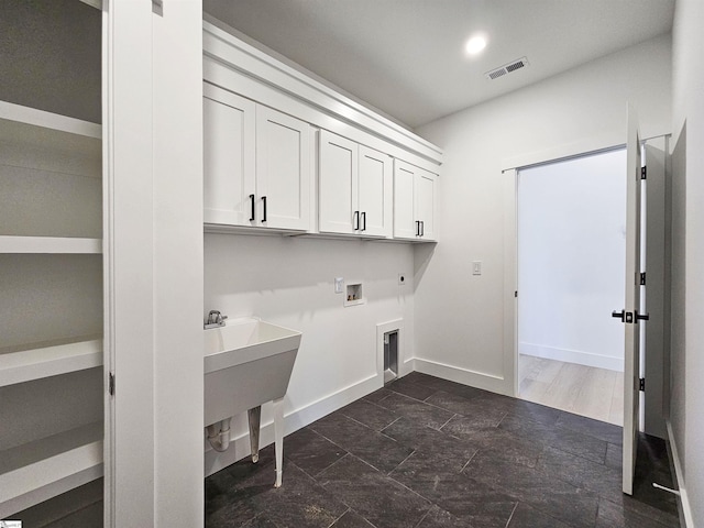 162 Refuge Church Rd, Central, SC 29630 - laundry room featuring cabinet space, washer hookup, hookup for an electric dryer, and hookup for a gas dryer