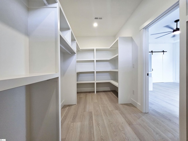 162 Refuge Church Rd, Central, SC 29630 - walk in closet featuring light wood-type flooring and ceiling fan