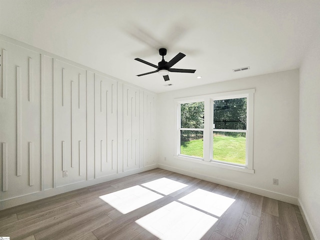 162 Refuge Church Rd, Central, SC 29630 - spare room with wood finished floors, ceiling fan, and recessed lighting