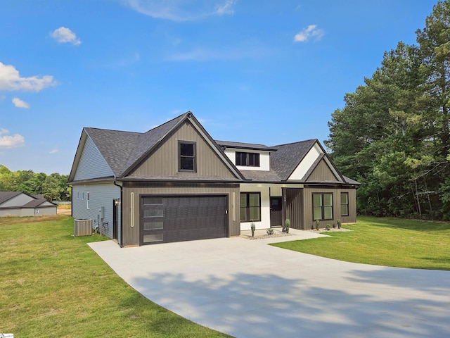 162 Refuge Church Rd, Central, SC 29630 - view of front facade with concrete driveway, a shingled roof, a front yard, and a garage