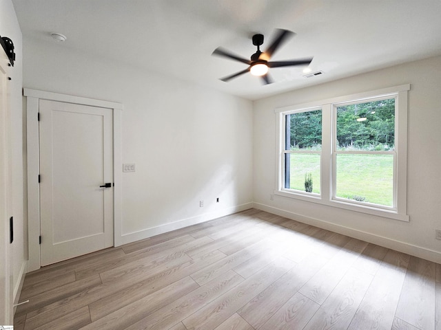 162 Refuge Church Rd, Central, SC 29630 - spare room featuring light wood-style floors, healthy amount of natural light, and ceiling fan