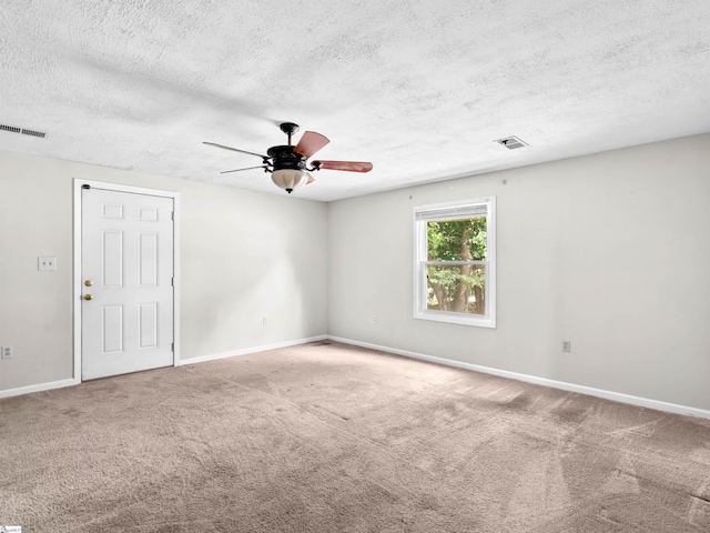113 Commodore Dr, Duncan, SC 29334 - empty room featuring a textured ceiling, ceiling fan, and carpet floors