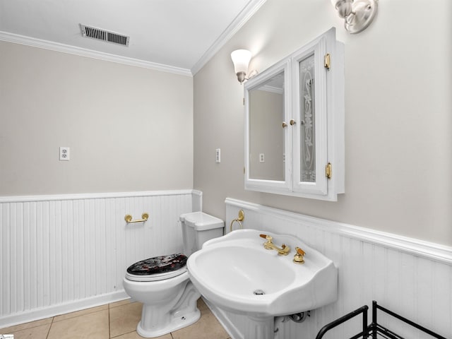 113 Commodore Dr, Duncan, SC 29334 - half bath with tile patterned flooring, a wainscoted wall, and crown molding