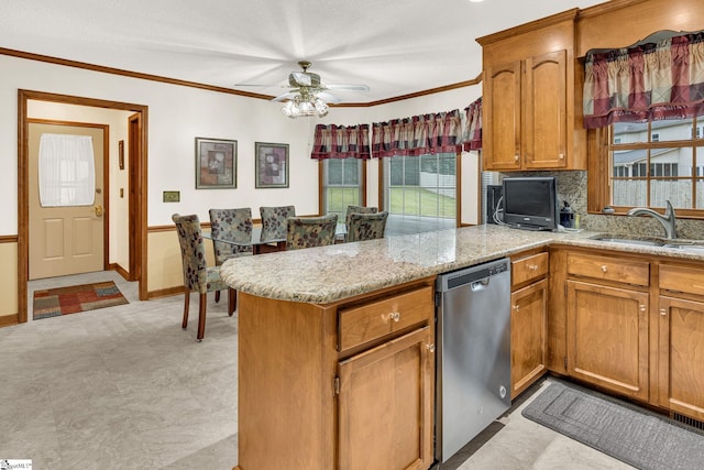 102 Linwood Ct, Simpsonville, SC 29681 - kitchen with stainless steel dishwasher, a peninsula, brown cabinets, a ceiling fan, and light stone countertops