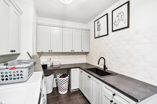 237 Rockcrest Dr, Taylors, SC 29687 - laundry room featuring cabinet space, washer and dryer, and dark tile patterned floors