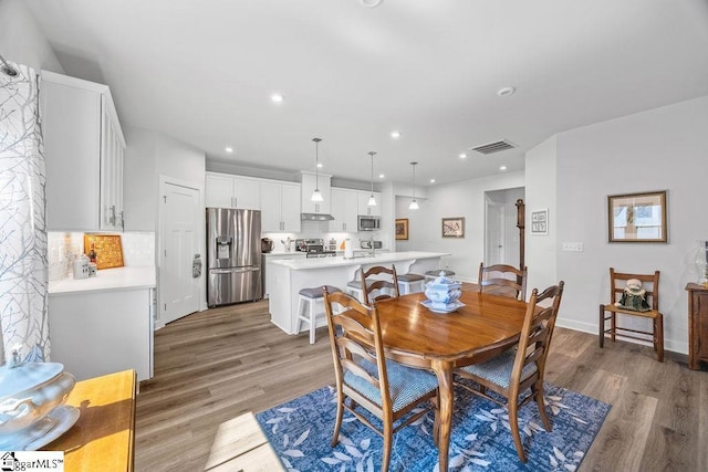 18 Yakama Way, Greenville, SC 29607 - dining space with light wood-style floors and recessed lighting